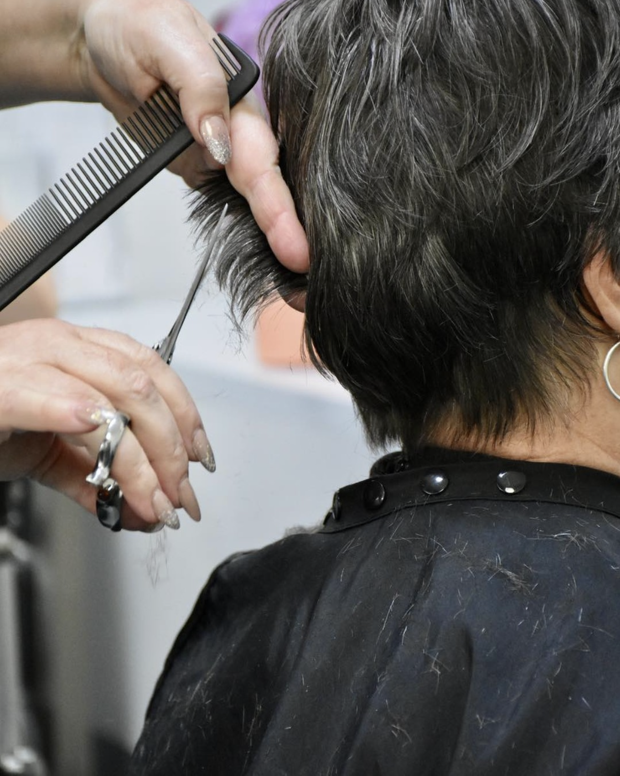 nicole cutting hair in progress